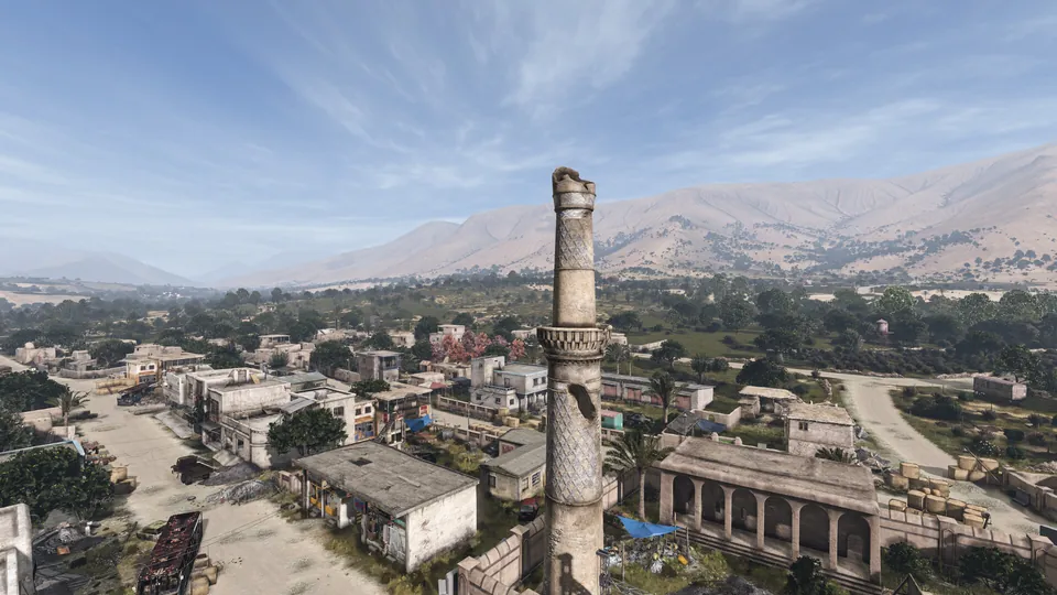 A ruined desert town and minaret in the DayZ Badlands map Nasdara Province